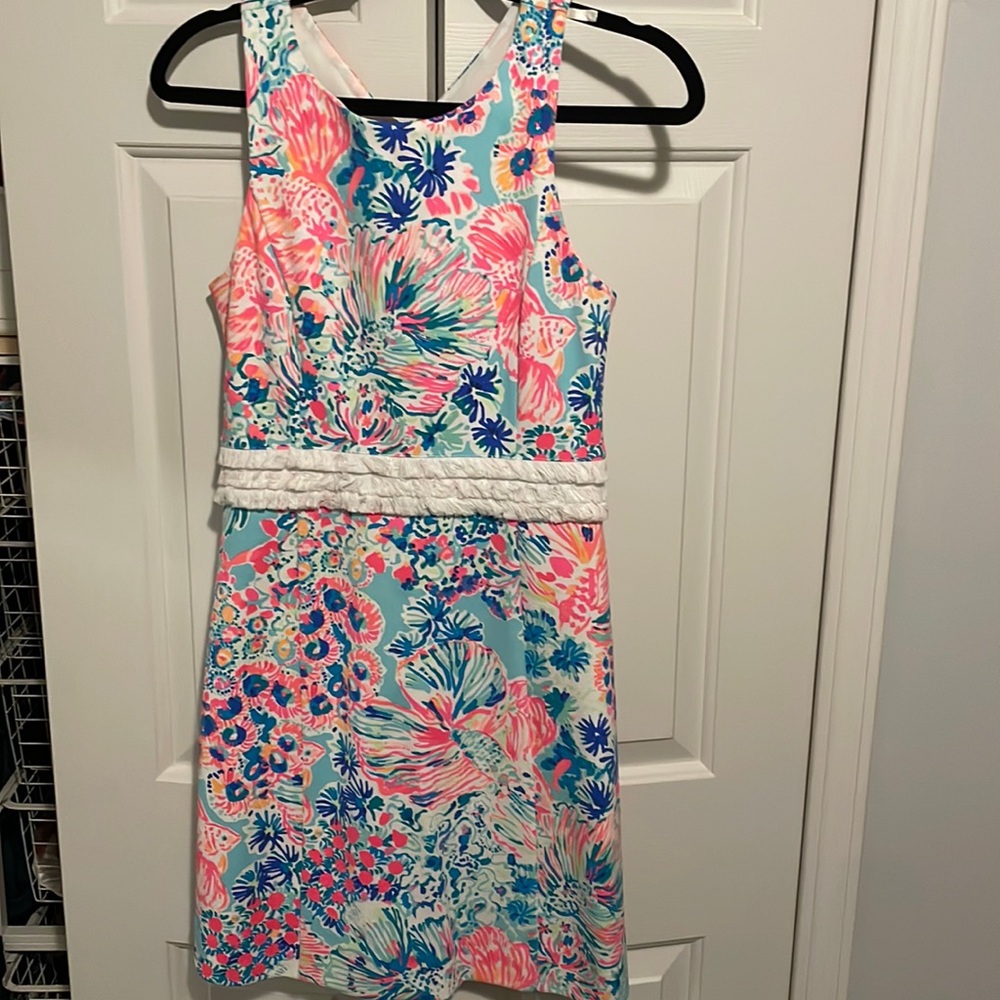 Lilly Pulitzer dress with white frills around waist